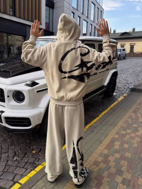 Corteiz Woosh Open Hem Sweatpants in the Bone color