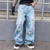 ALEXANDER WANG DISTRESSED DENIM JEANS