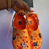 b3eb5312-61fa-4461-a4a5-01e0ffb152d5 Orange Camo Charm Clogs